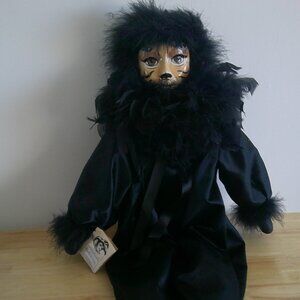 Miss Kitty Musical Porcelain Cat Doll.  Crack on face..Music box works